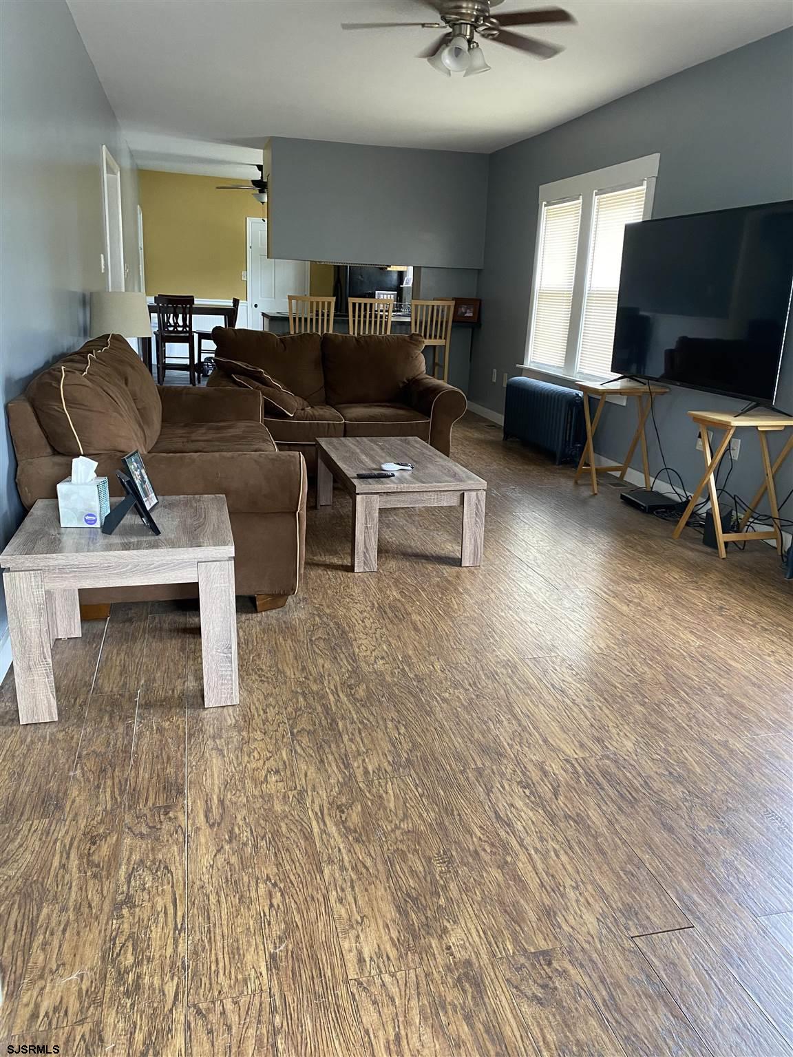 237 Marlin Road Absecon, NJ 08201 - Photo 5 of 25 a living room with furniture and a flat screen tv