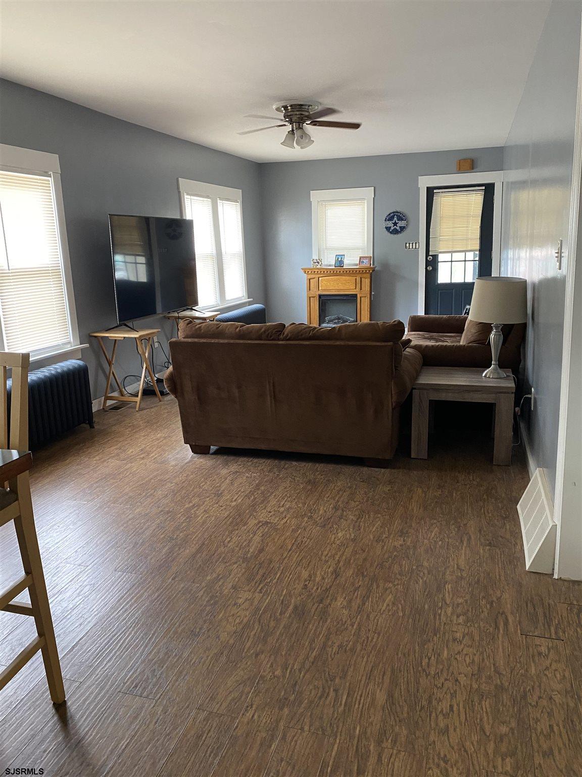237 Marlin Road Absecon, NJ 08201 - Photo 6 of 25 a living room with furniture and a flat screen tv
