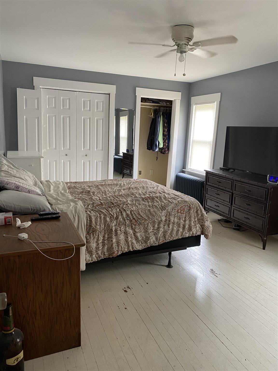 237 Marlin Road Absecon, NJ 08201 - Photo 10 of 25 a bedroom with a bed and a television