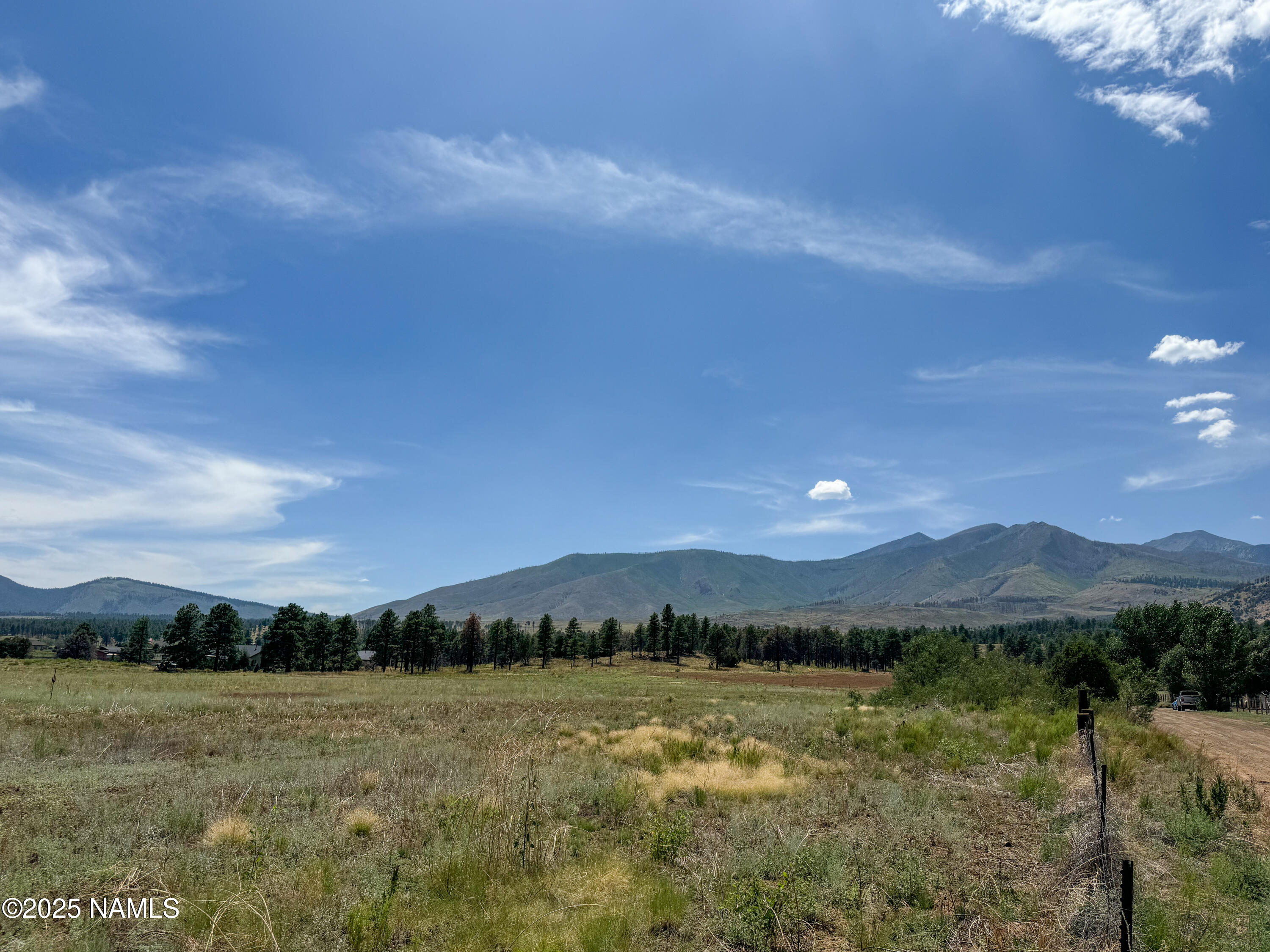 a view of lake and mountain