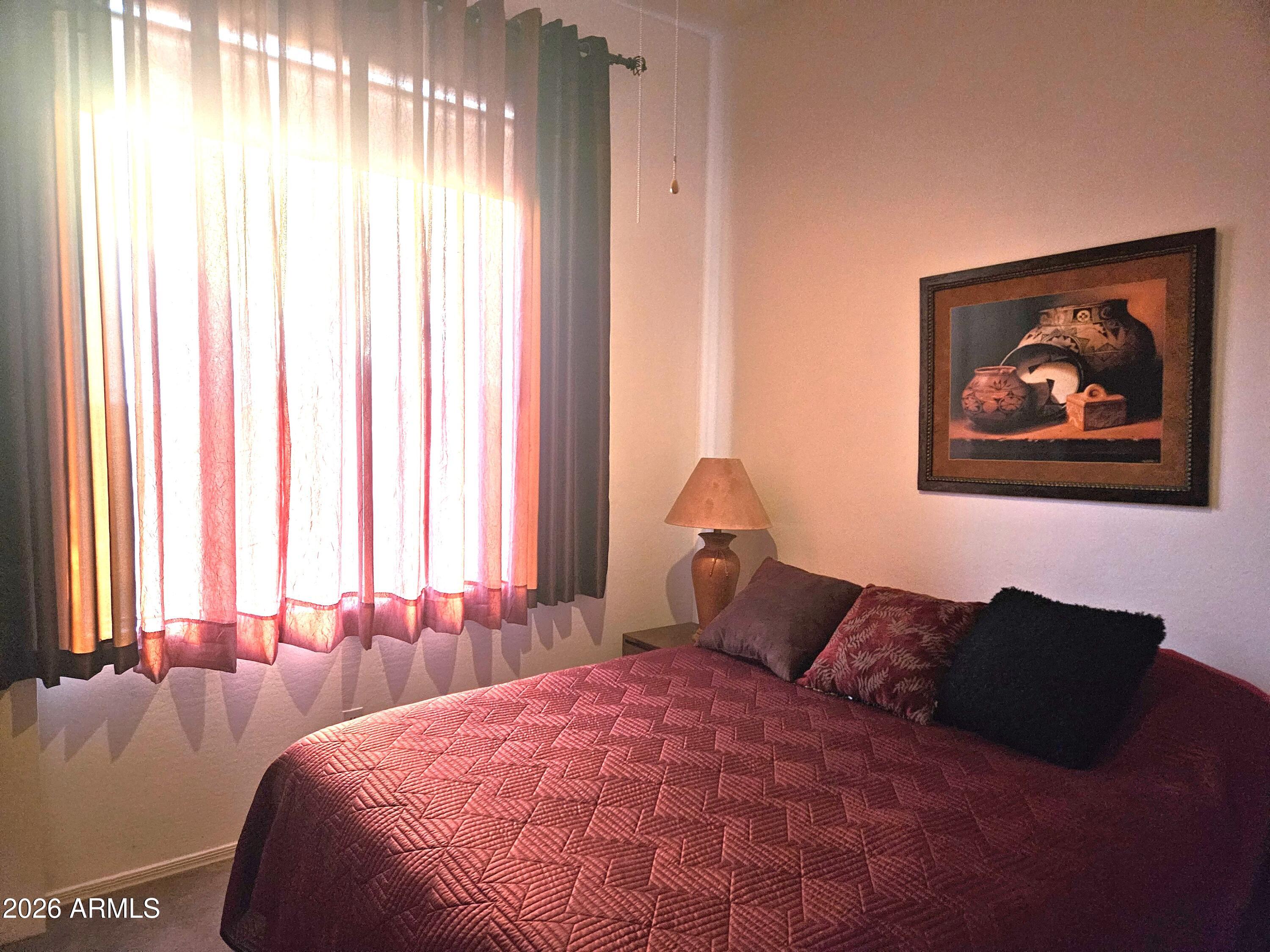 3333 West Latona Road Laveen, AZ 85339 - Photo 4 of 13 Natural light floods the bedrooms.