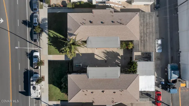an aerial view of a house with street view