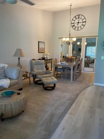 a living room with furniture and a table