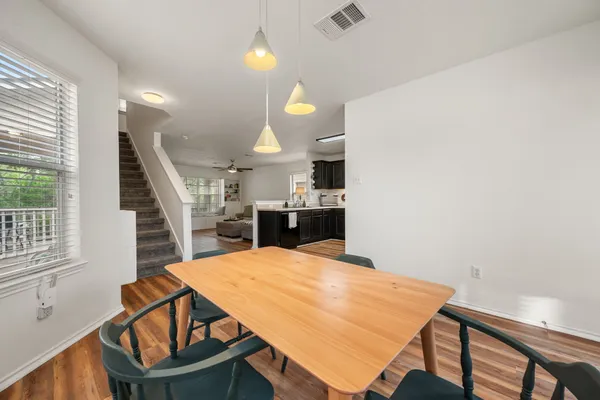 a room with furniture and a wooden floor