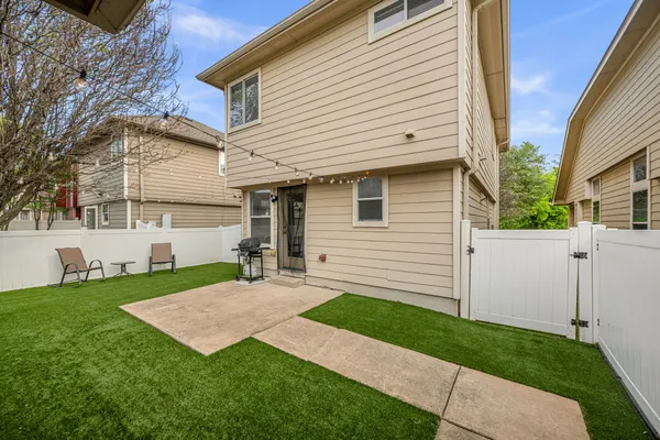 a view of a backyard with a garden