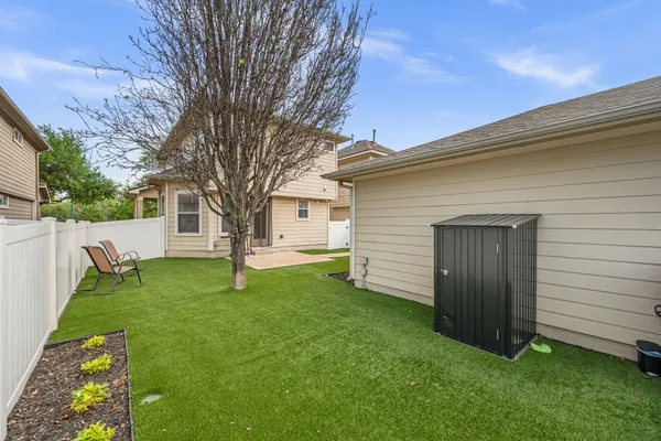 a view of a backyard with a garden