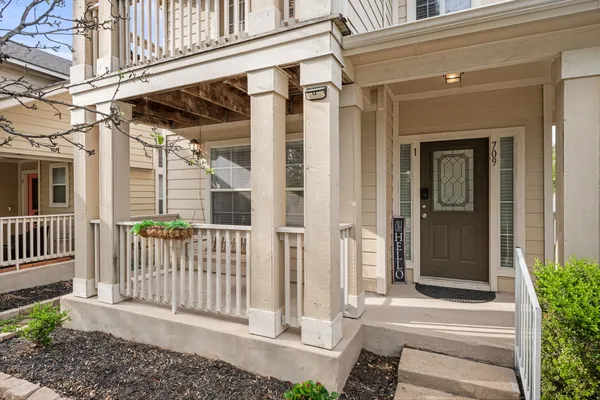 a front view of a house with a porch