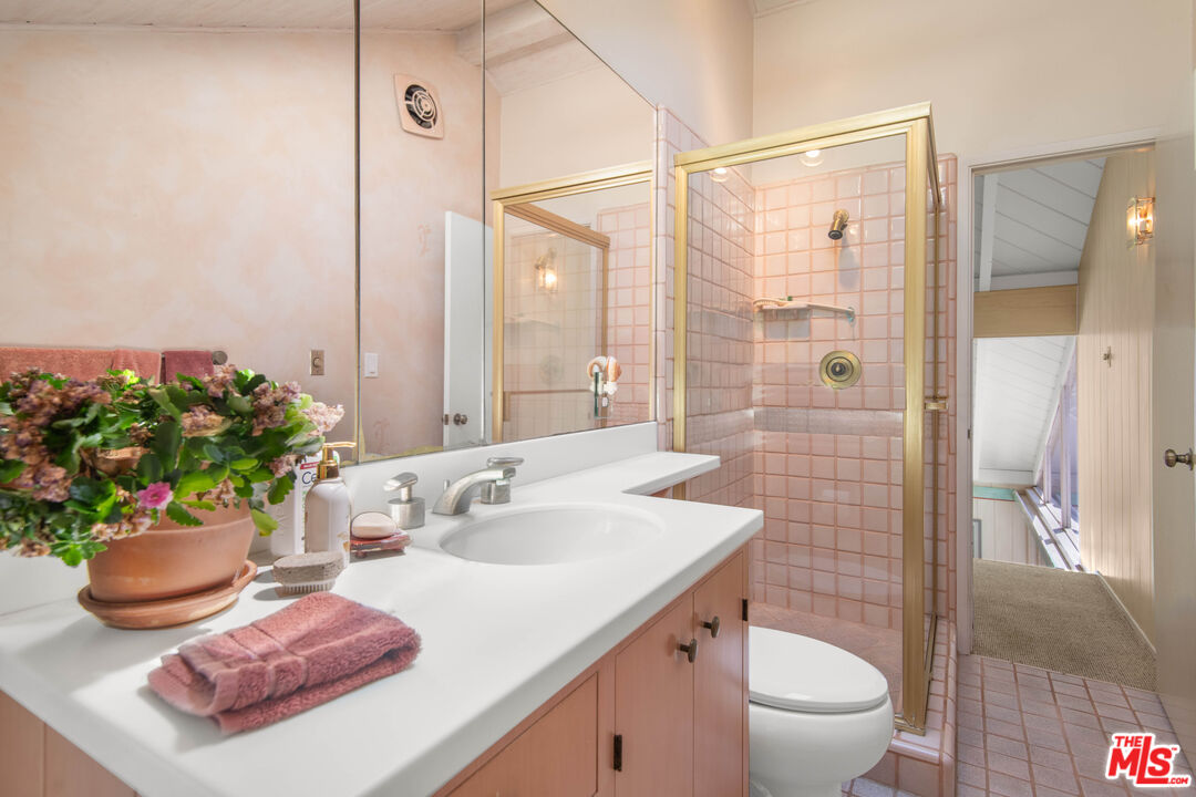 31649 Sea Level Drive Malibu, CA 90265 - Photo 17 of 26 a bathroom with a sink a toilet and shower