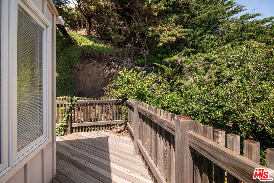 31649 Sea Level Drive Malibu, CA 90265 - Photo 19 of 26 a view of a balcony with wooden floor
