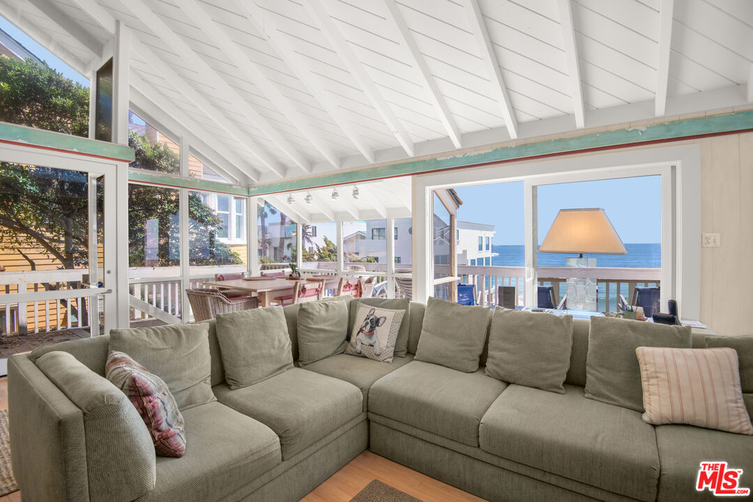 31649 Sea Level Drive Malibu, CA 90265 - Photo 6 of 26 a living room with furniture and a large window