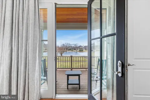 a view of a two chairs in the deck