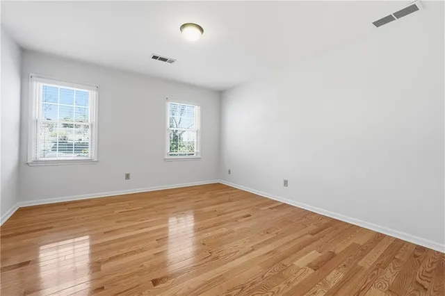 an empty room with windows