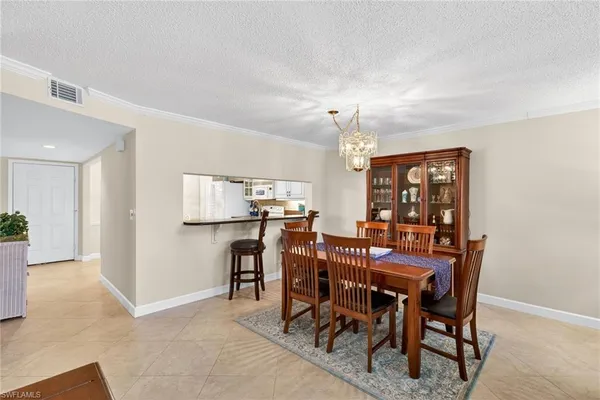 $329,000 | 6700 Dennis Circle, Unit A102, Naples, FL 34104