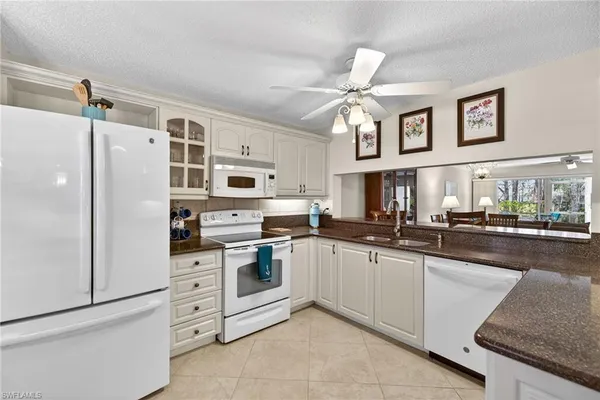 $329,000 | 6700 Dennis Circle, Unit A102, Naples, FL 34104