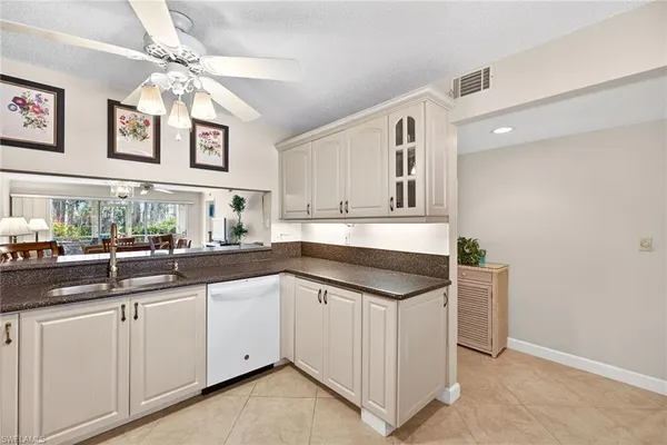 $329,000 | 6700 Dennis Circle, Unit A102, Naples, FL 34104