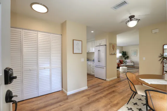 a view of a kitchen and dining room
