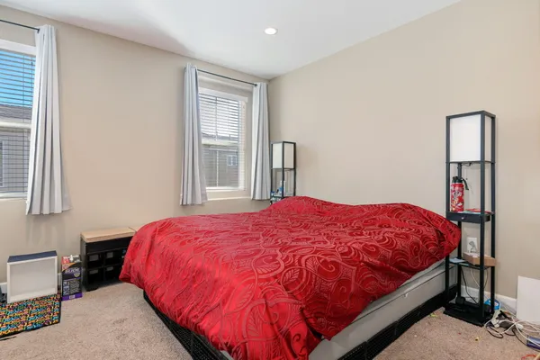 a bathroom with a double vanity sink and mirror