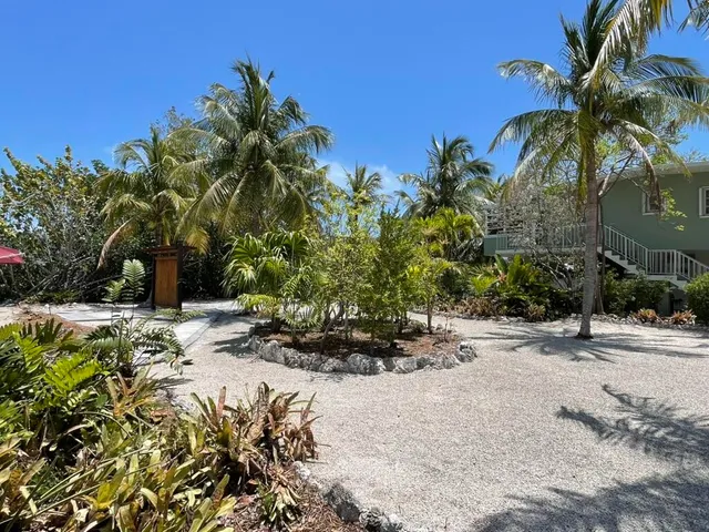 a view of a backyard of a house