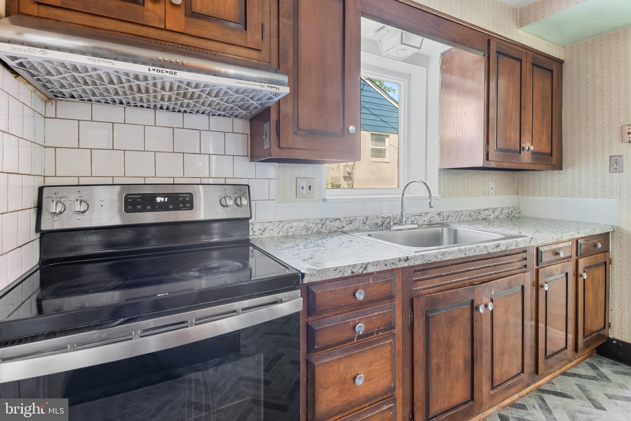 2206 Prichard Road Silver Spring, MD 20902 - Photo 15 of 33 Newer stove, counters, new refrigerator, and more