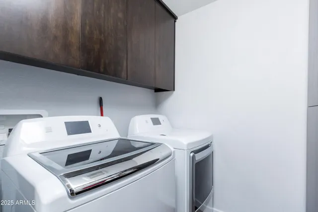 a bedroom with a bed and a desk