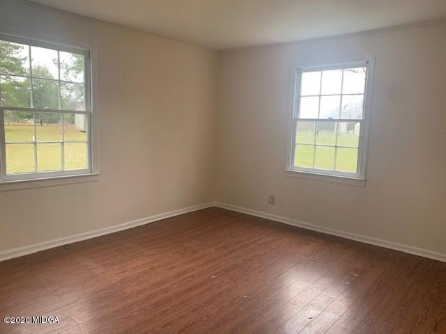 2154 Taylors Mill Road Fort Valley, GA 31030 - Photo 11 of 17 an empty room with a window