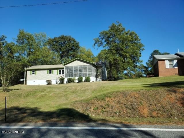 2154 Taylors Mill Road Fort Valley, GA 31030 - Photo 17 of 17 a front view of a house with garden