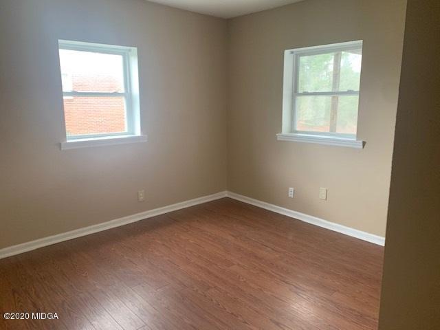 2154 Taylors Mill Road Fort Valley, GA 31030 - Photo 9 of 17 an empty room with a window