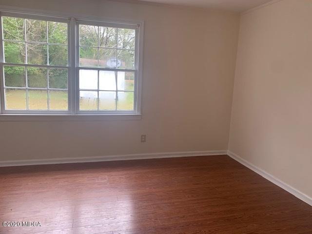 2154 Taylors Mill Road Fort Valley, GA 31030 - Photo 10 of 17 an empty room with a window