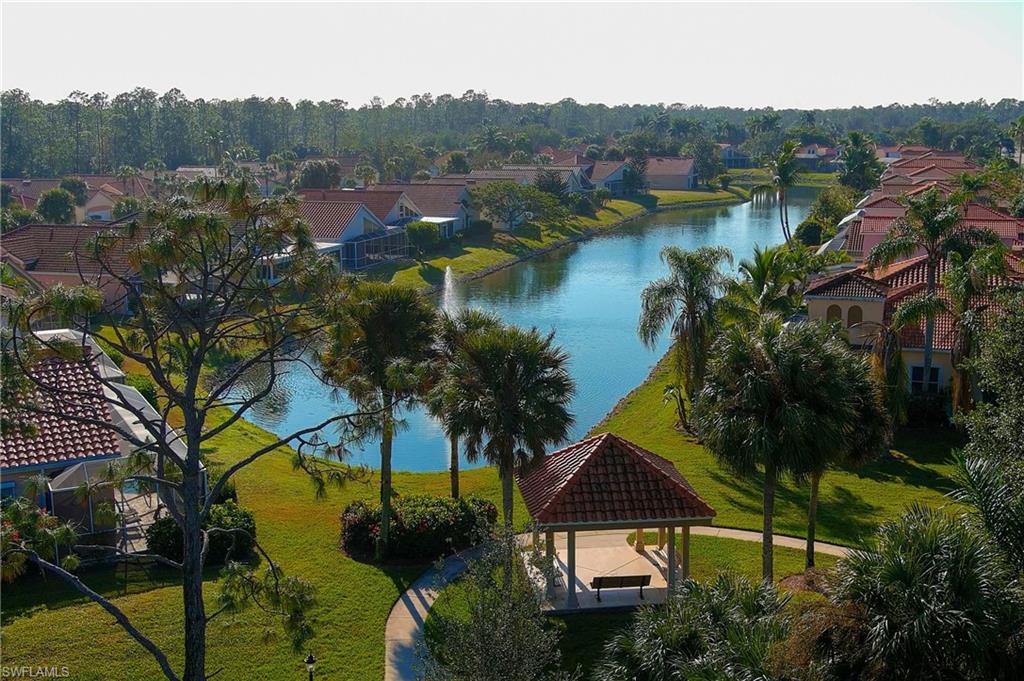 156 Sabal Lake Drive Naples, FL 34104 - Photo 30 of 40 an aerial view of residential house with outdoor space and lake view
