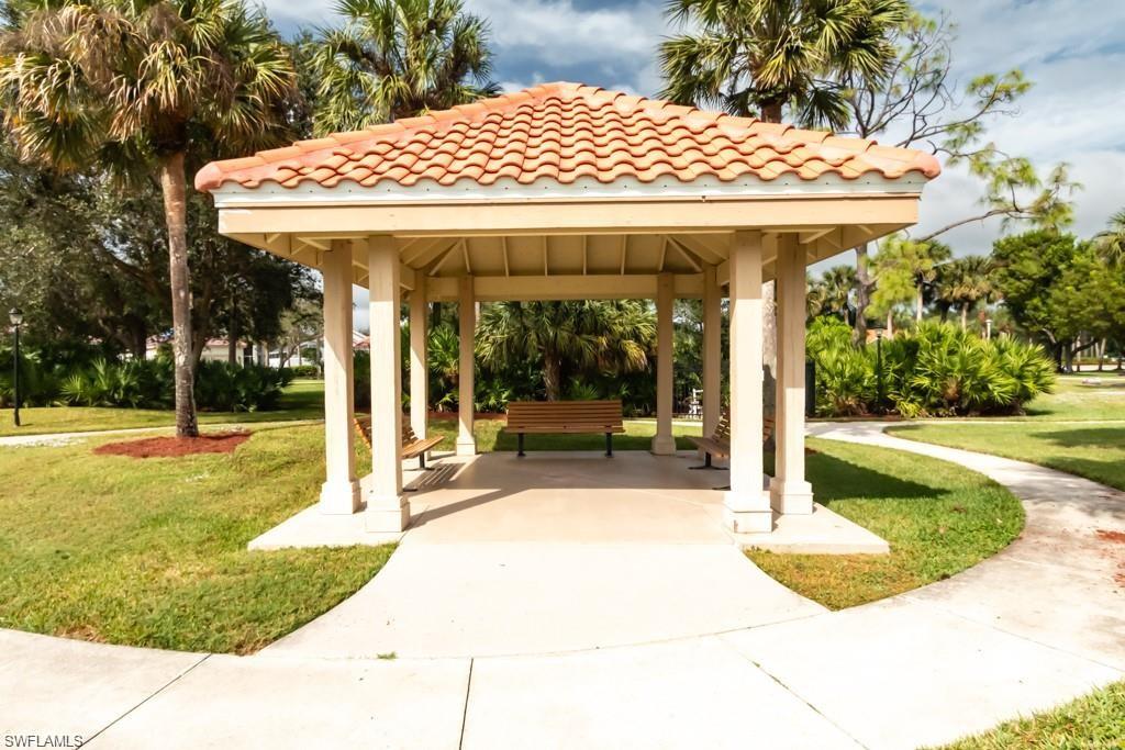 156 Sabal Lake Drive Naples, FL 34104 - Photo 32 of 40 a view of a house with outdoor space