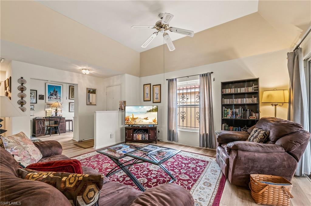 156 Sabal Lake Drive Naples, FL 34104 - Photo 7 of 40 a bedroom with a bed furniture and a window