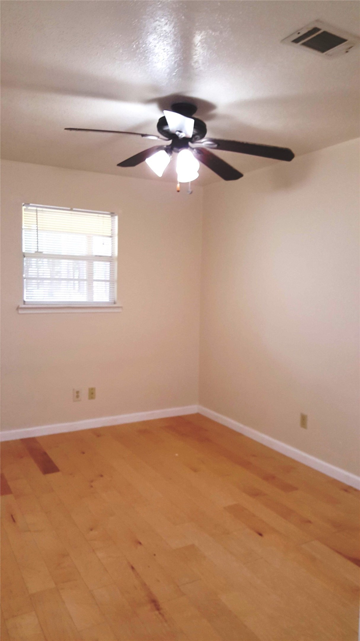 12105 Old County Road Willis, TX 77378 - Photo 8 of 13 a view of an empty room with a window
