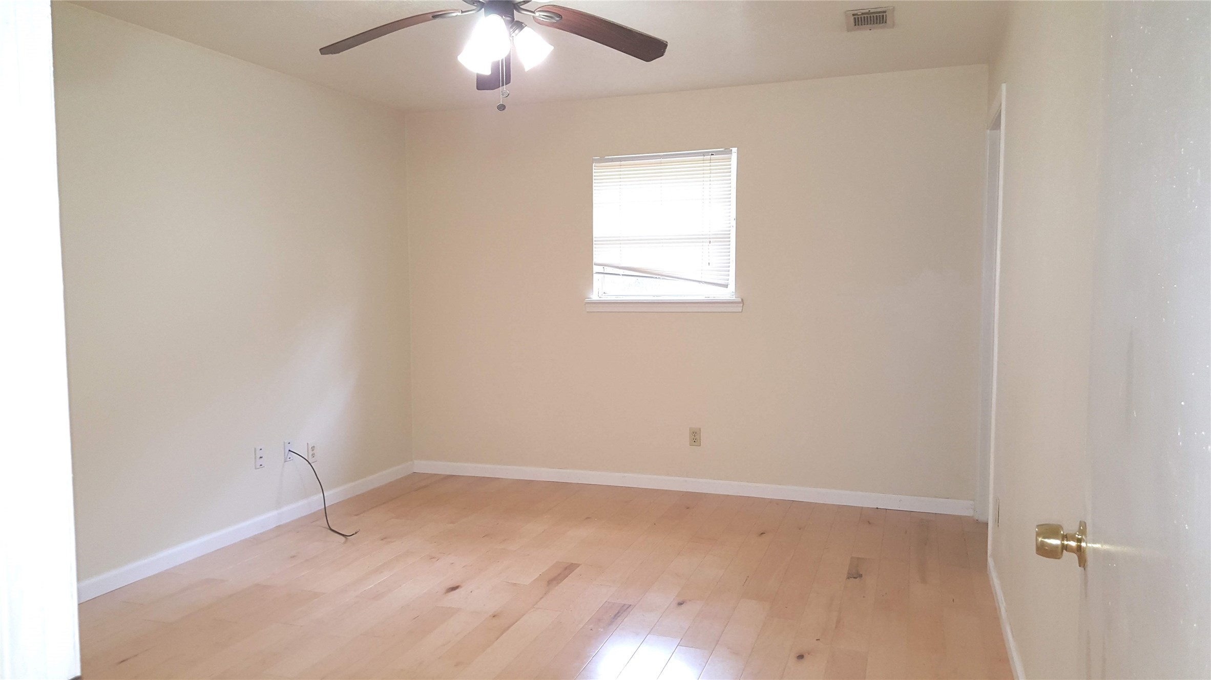 12105 Old County Road Willis, TX 77378 - Photo 10 of 13 an empty room with a window
