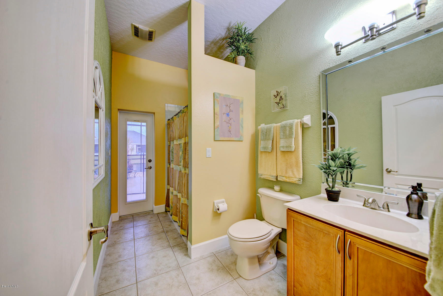 3965 Waterford Drive Rockledge, FL 32955 - Photo 36 of 50 Bathroom 2 Access to Pool