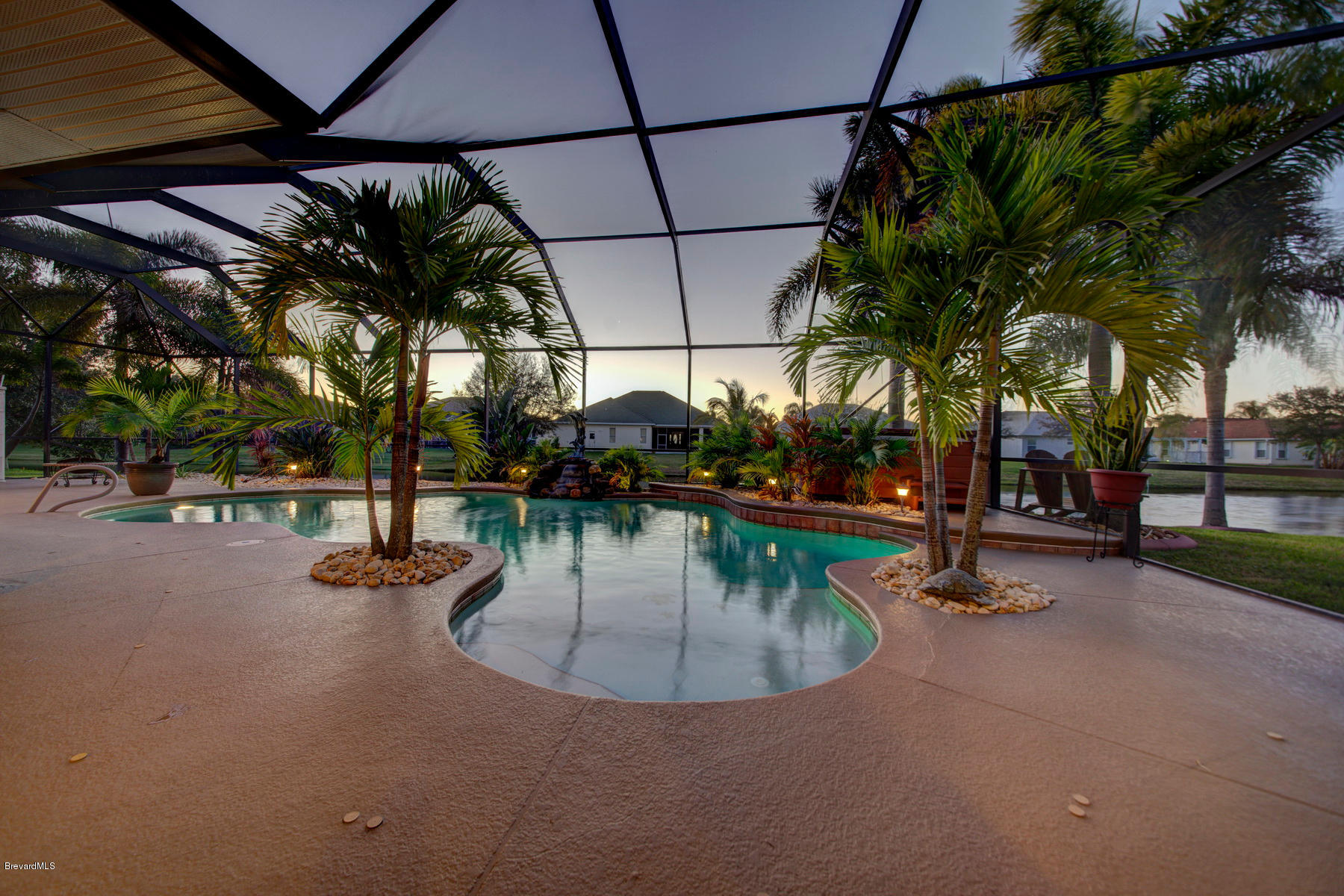 3965 Waterford Drive Rockledge, FL 32955 - Photo 42 of 50 Night time by the pool