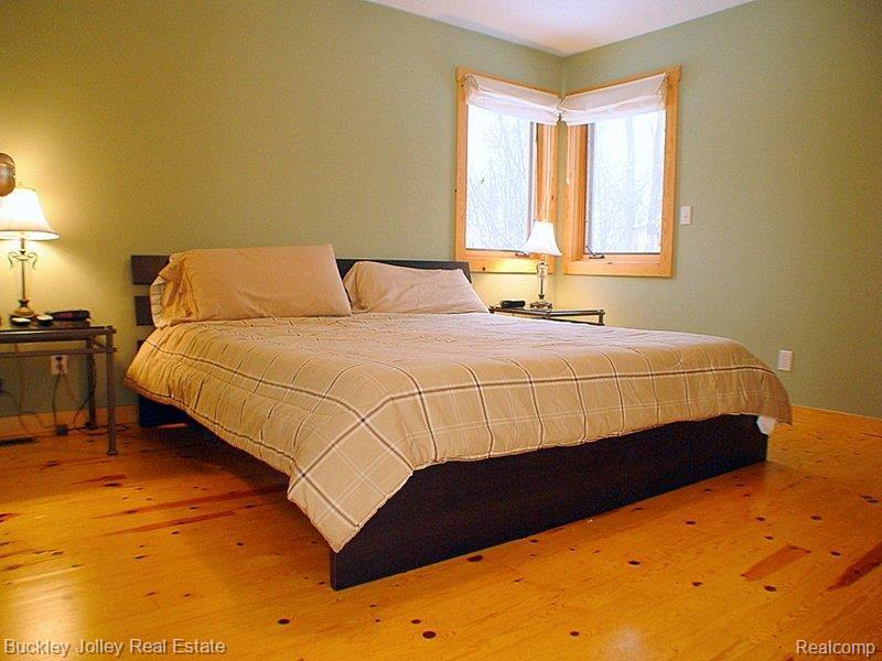 9101 North Latson Road Howell, MI 48855 - Photo 9 of 16 Master Bedroom