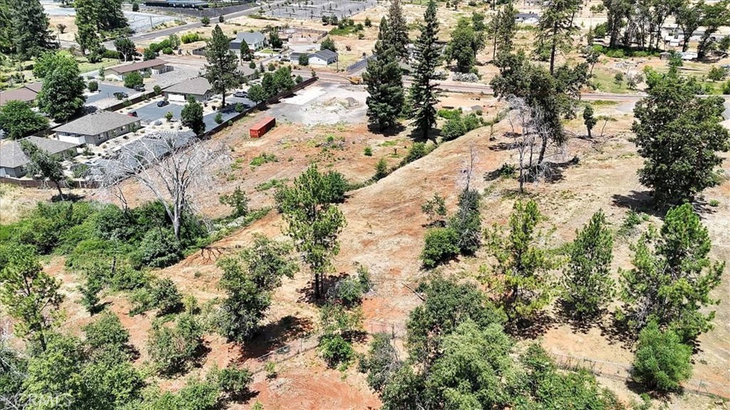 1020 Elliott Road Paradise, CA 95969 - Photo 13 of 20 an aerial view of a house with a yard and large trees