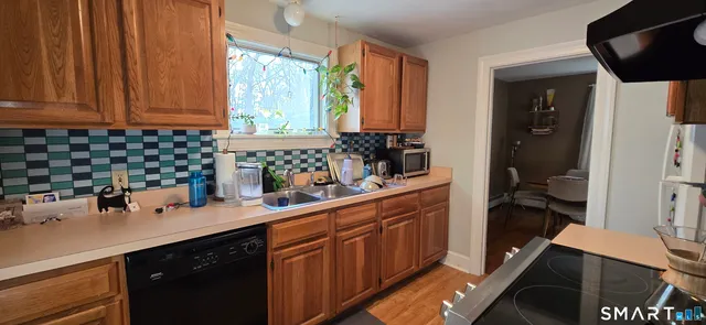 a kitchen with a sink and cabinets