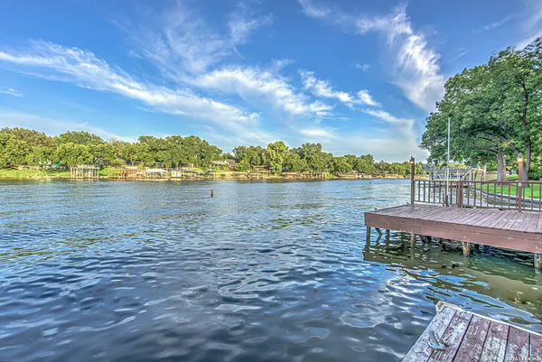 a view of a terrace with a lake view