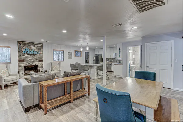 a living room with furniture and a table