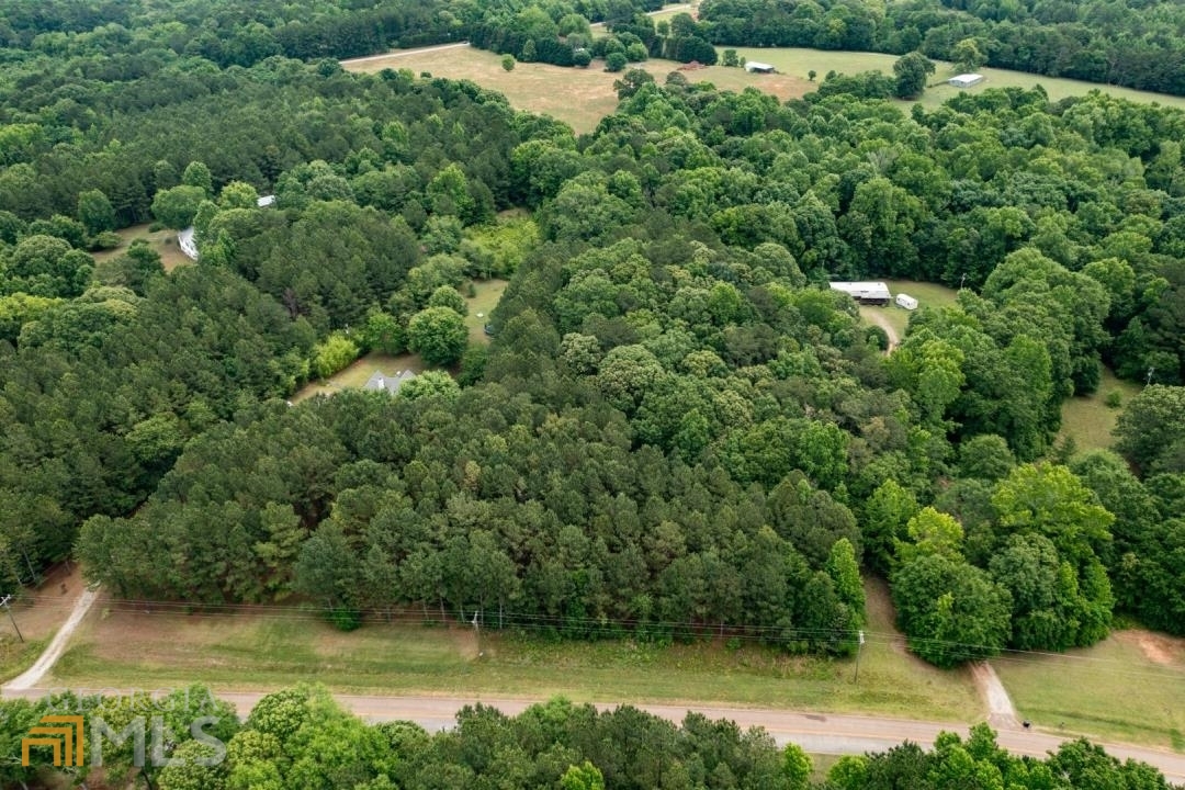0 Mangham Road Griffin, GA 30224 - Photo 1 of 1 an aerial view of a houses with yard and lake view