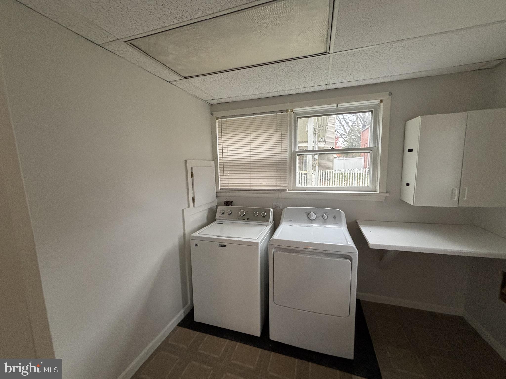 401 Main Street, Unit A Denver, PA 17517 - Photo 12 of 12 a utility room with dryer and washer