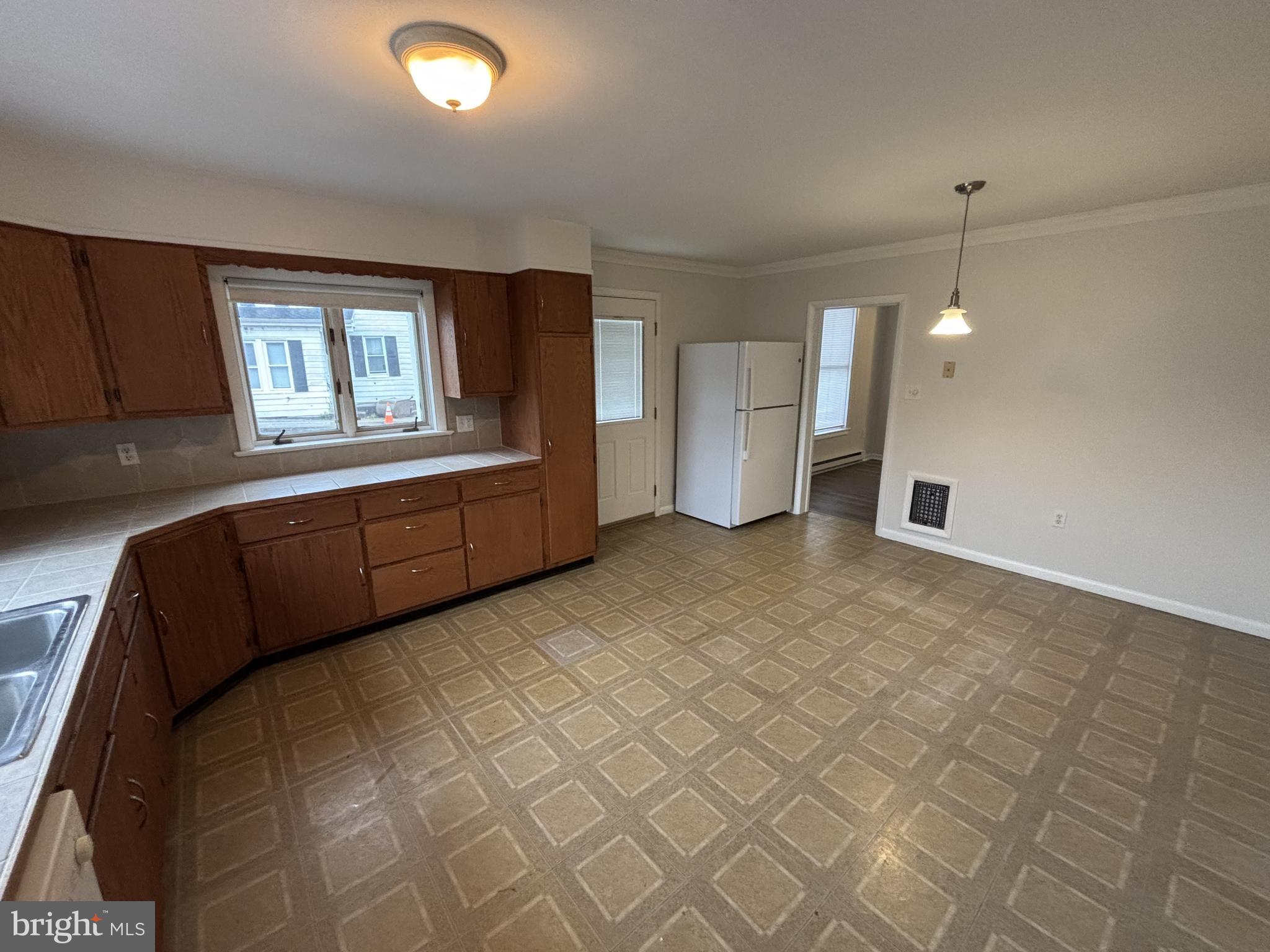401 Main Street, Unit A Denver, PA 17517 - Photo 2 of 12 a living room with furniture and window