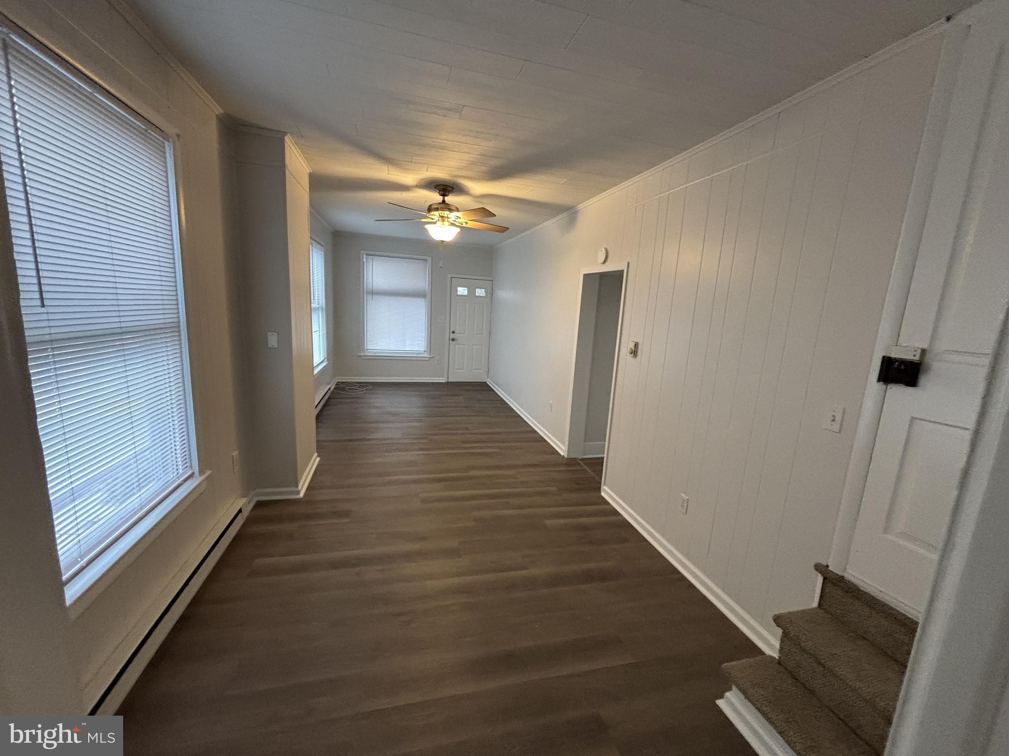 401 Main Street, Unit A Denver, PA 17517 - Photo 5 of 12 a view of a hallway with wooden floor
