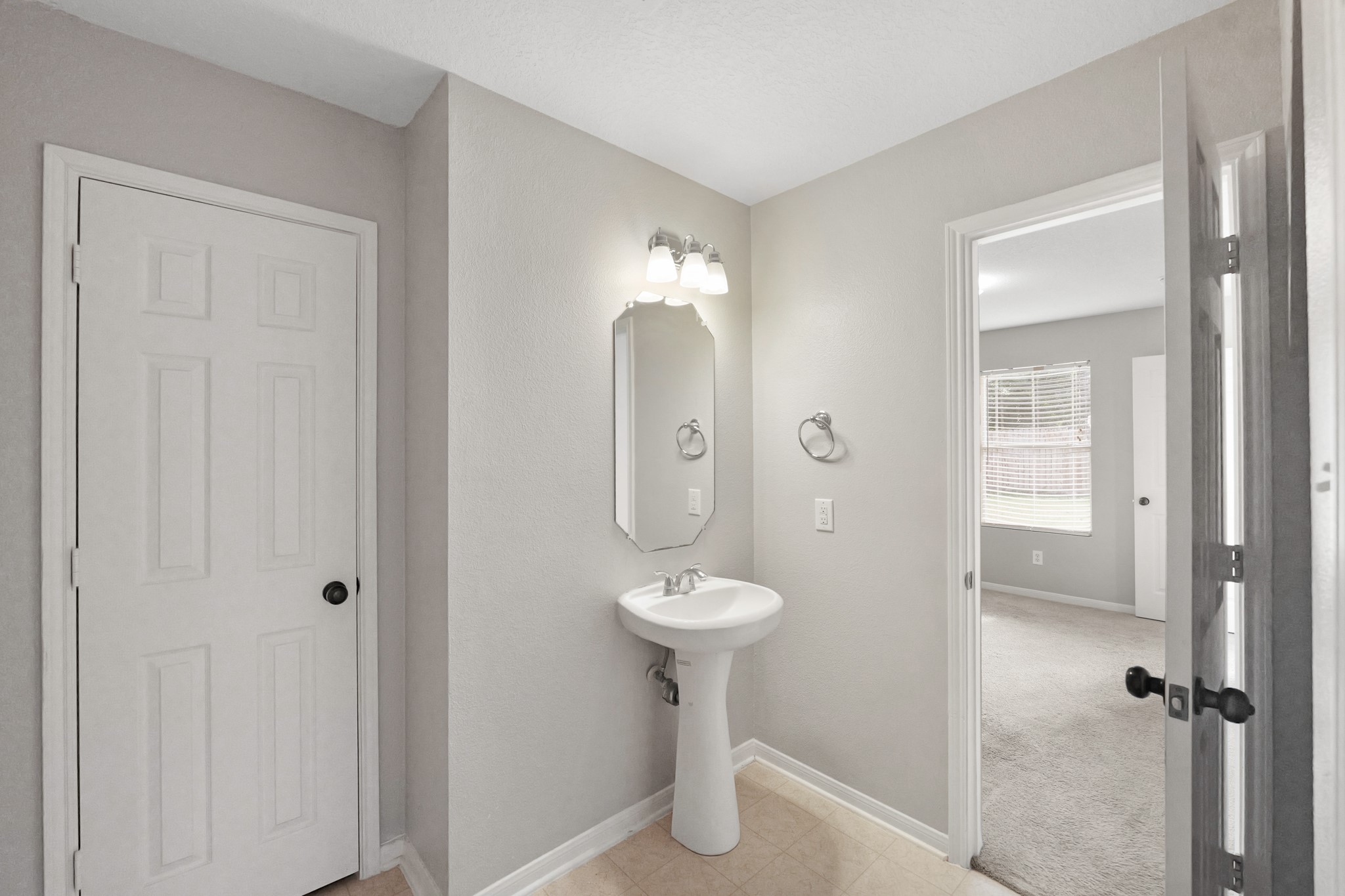 20410 Fall Foliage Drive Humble, TX 77338 - Photo 18 of 35 a bathroom with a shower