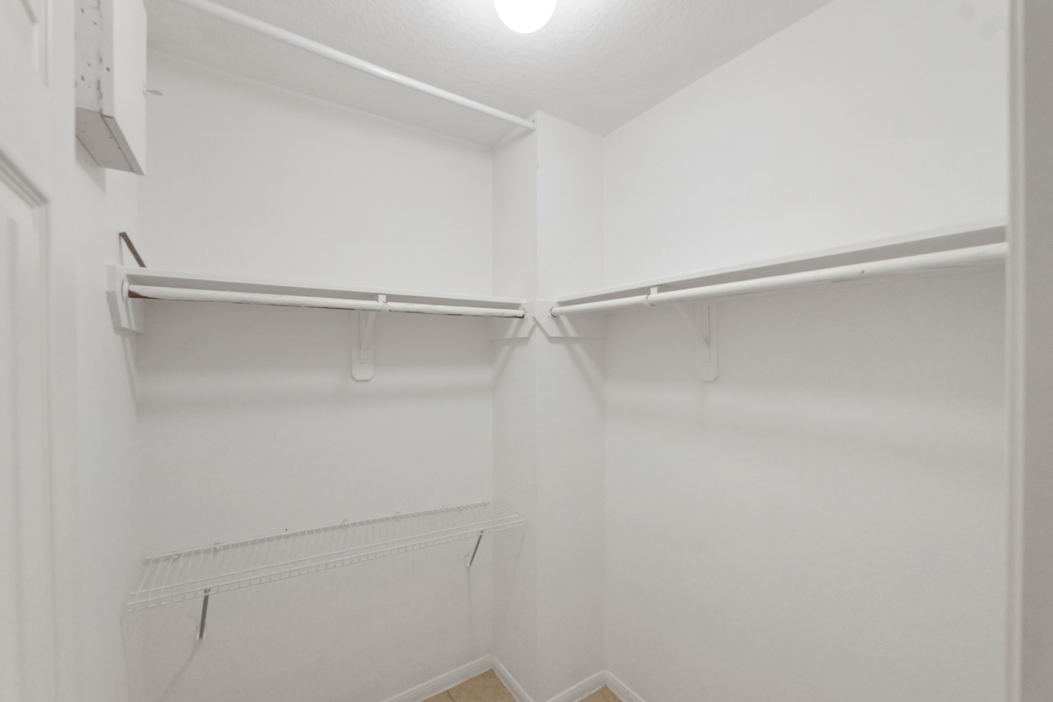 20410 Fall Foliage Drive Humble, TX 77338 - Photo 31 of 35 a view of an empty walk in closet