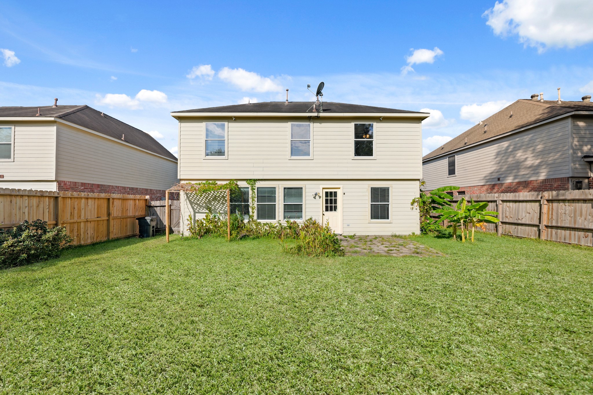 20410 Fall Foliage Drive Humble, TX 77338 - Photo 32 of 35 a view of a yard in front of a house