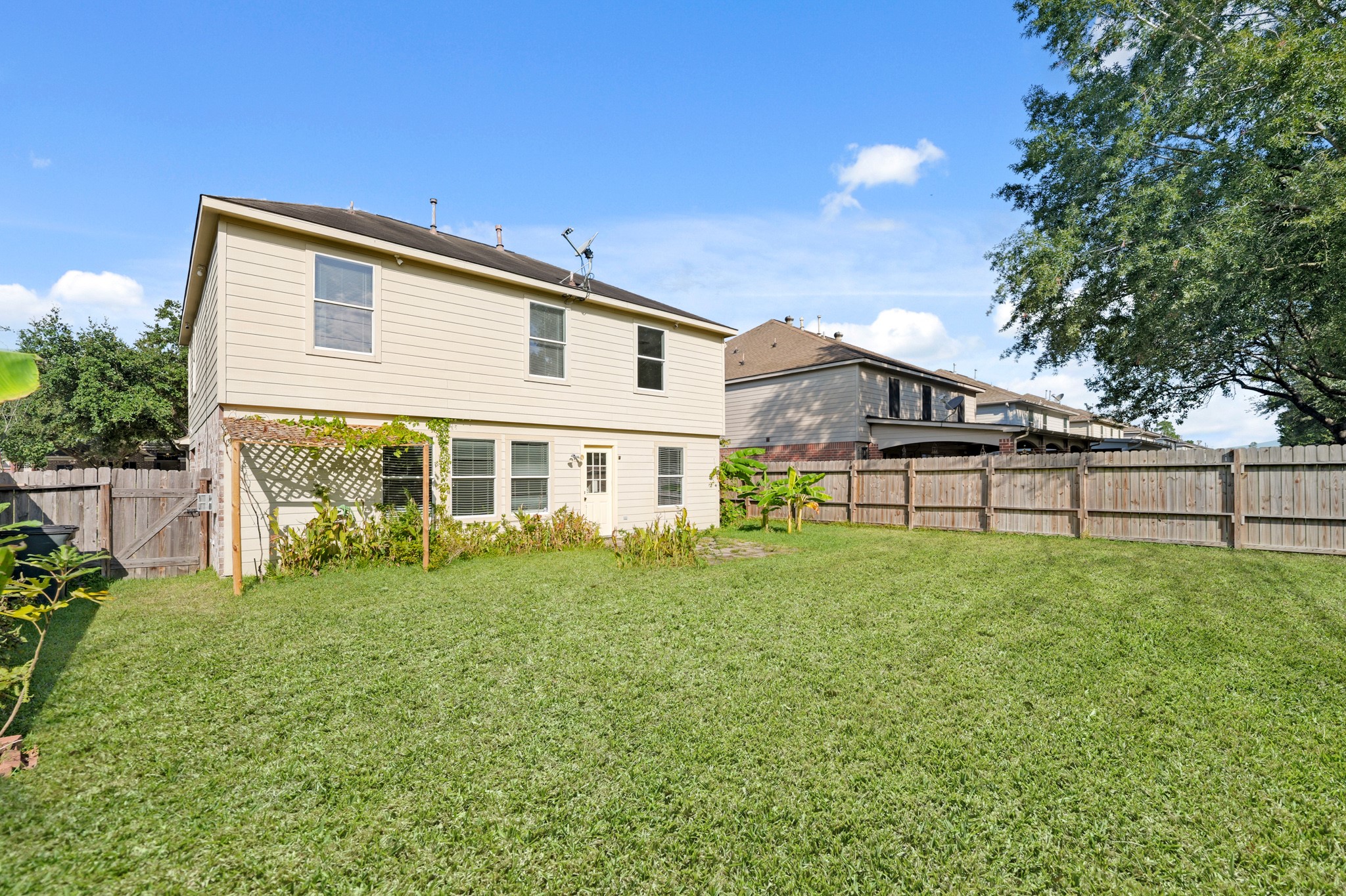 20410 Fall Foliage Drive Humble, TX 77338 - Photo 34 of 35 a view of a house with a yard balcony and sitting area