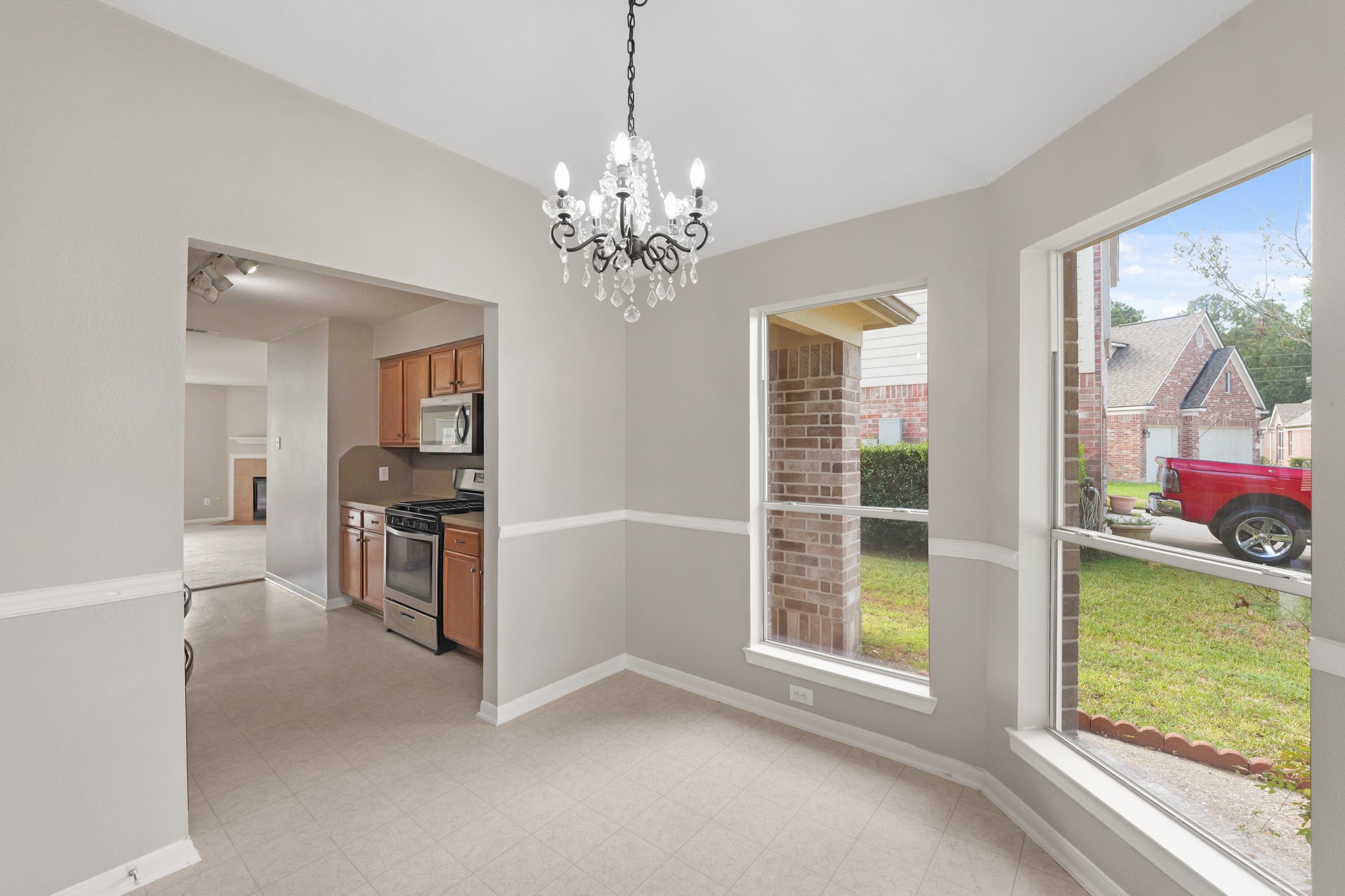 20410 Fall Foliage Drive Humble, TX 77338 - Photo 5 of 35 a view of a livingroom with a ceiling fan and window