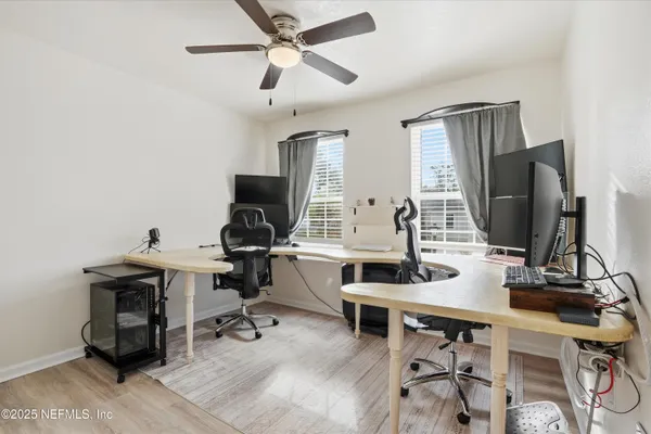 a view of a workspace with furniture